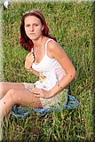 Cute redhead girl in the grass from Bunniesclub