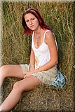 Cute redhead girl in the grass from Bunniesclub
