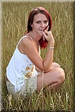 Cute redhead girl in the grass from Bunniesclub