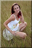 Cute redhead girl in the grass from Bunniesclub