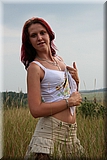 Cute redhead girl in the grass from Bunniesclub
