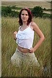 Cute redhead girl in the grass from Bunniesclub