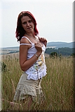 Cute redhead girl in the grass from Bunniesclub