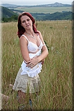 Cute redhead girl in the grass from Bunniesclub